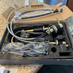 Modern Black and Gold bathroom faucet 
New in box